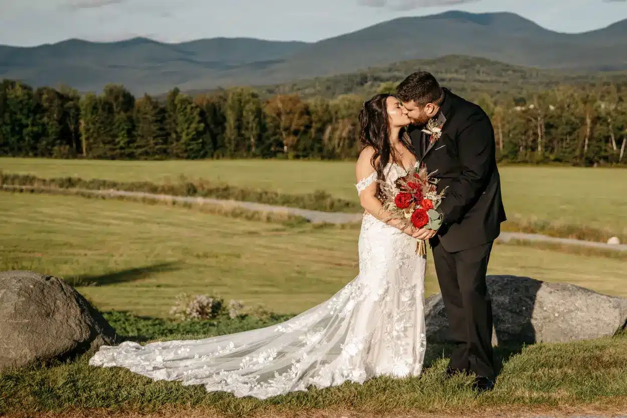 Couples kissing in fields