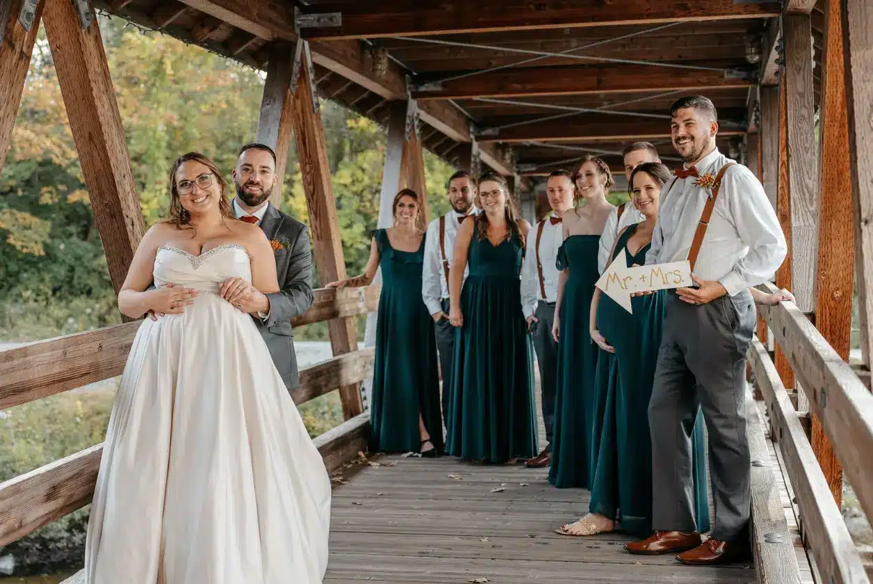Bride and groom under the bridge