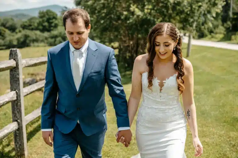 Couple Walking by the fence