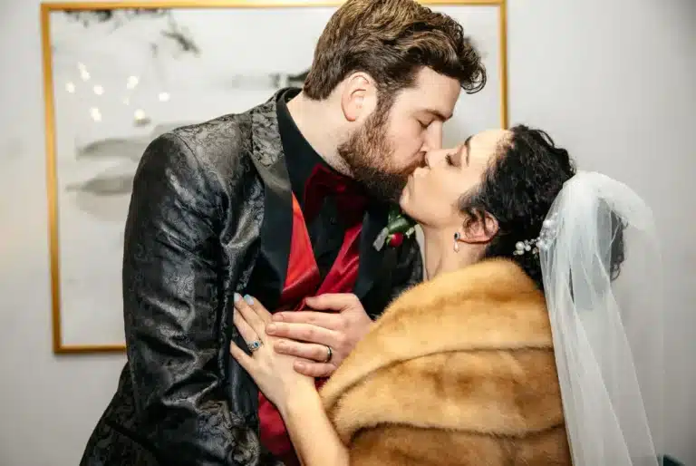 Groom kisses the bride