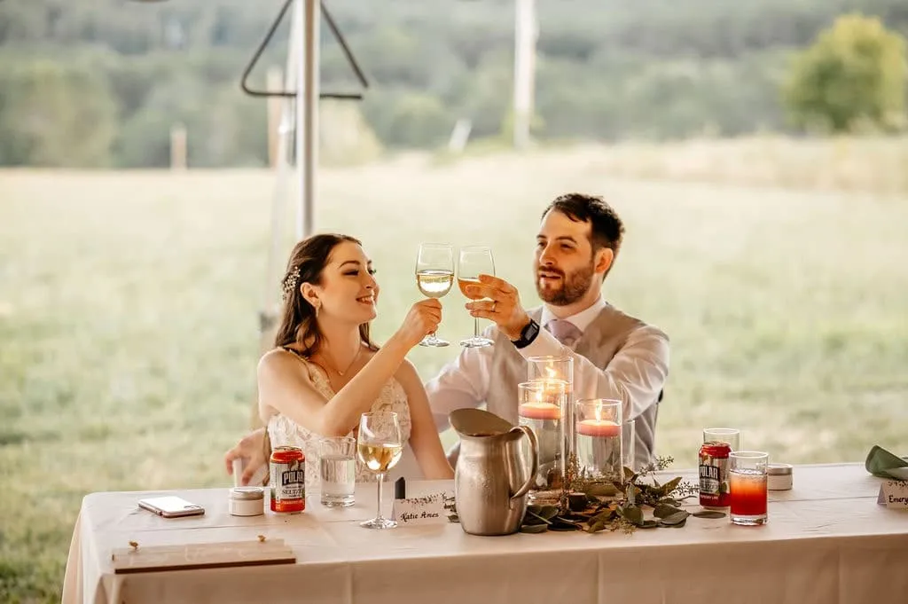 Bride and groom toast their wine glass | Love in Focus Studio