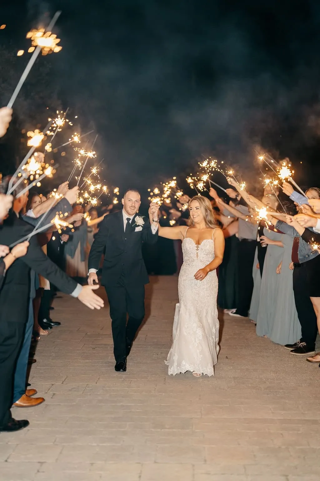 Bride and groom welcome walk | Love in Focus Studio