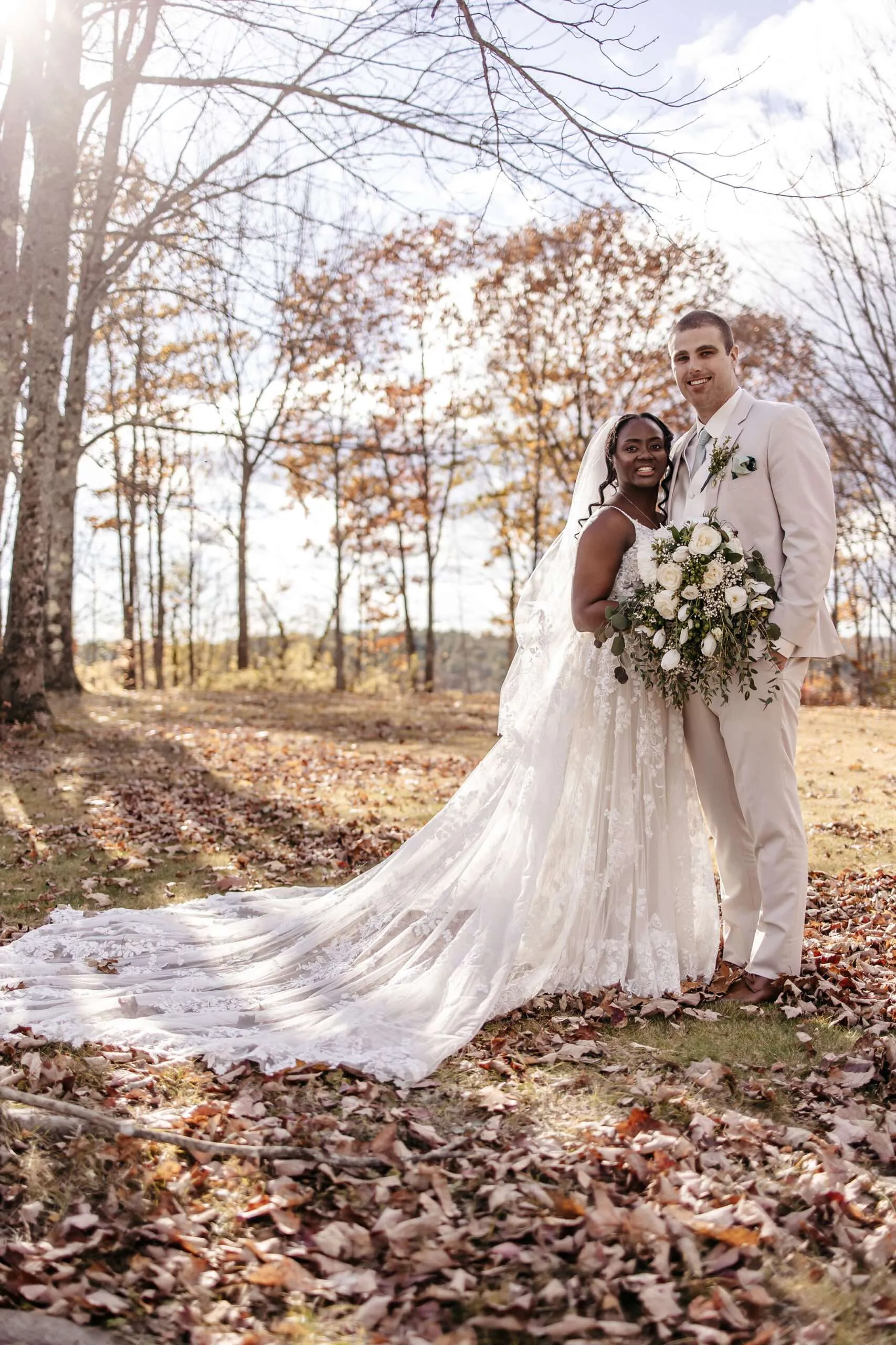 Bride and groom in autumn setting.