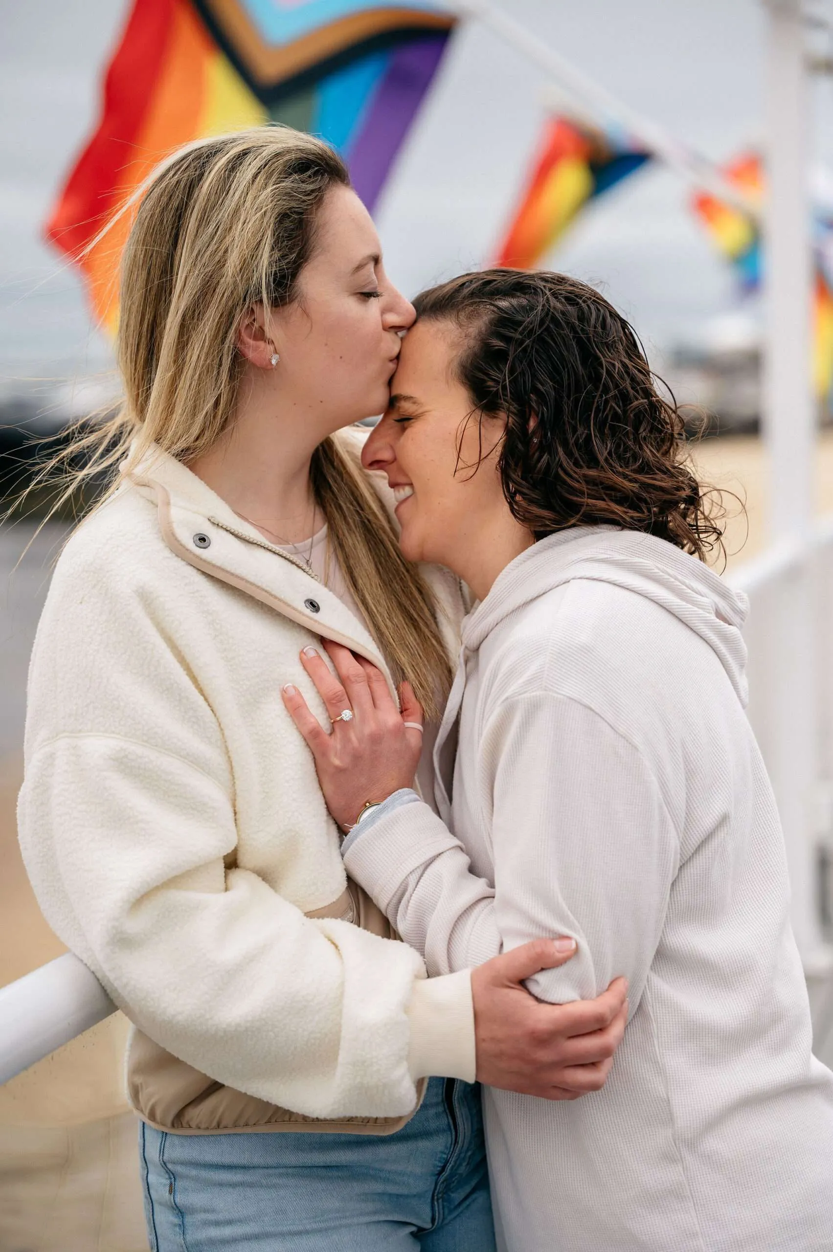 Ashley and Alanah sharing a romantic moment during their lesbian wedding photography session with Love In Focus.