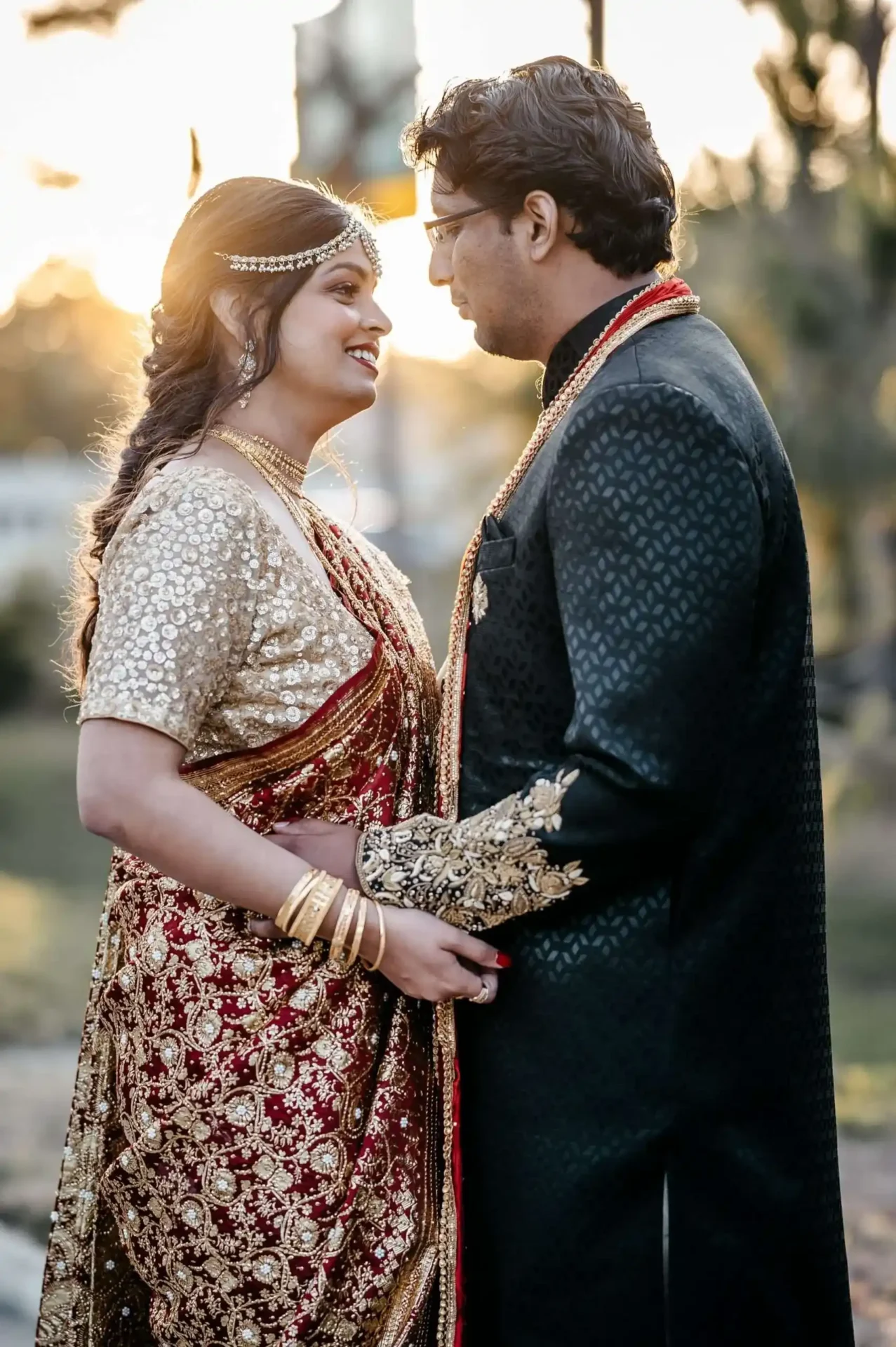 Classic portrait of bride Rita and groom Joseph leaving the church after their beautiful Indian Christian wedding ceremony.