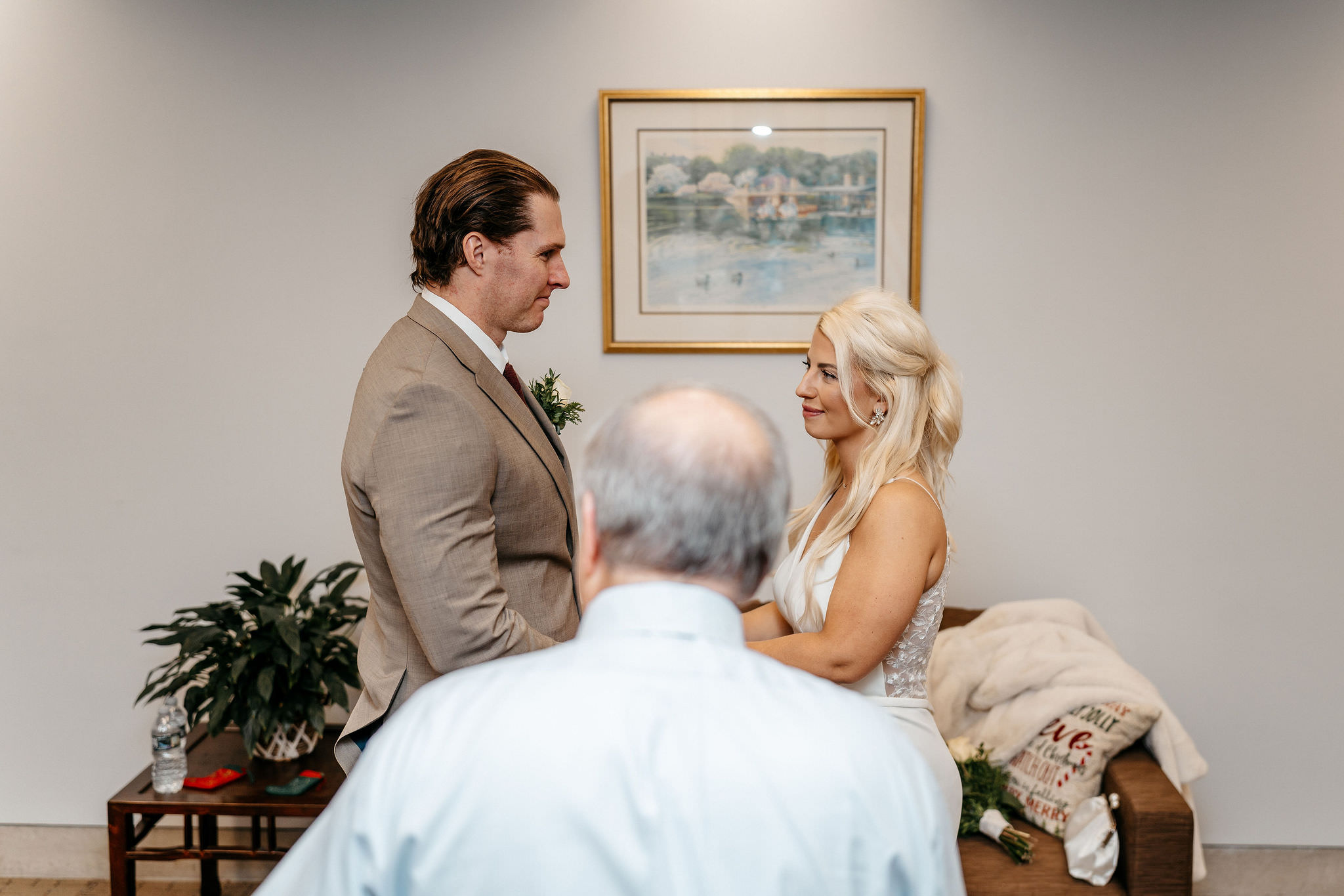Couple exchanging vows during an intimate Boston City Hall ceremony