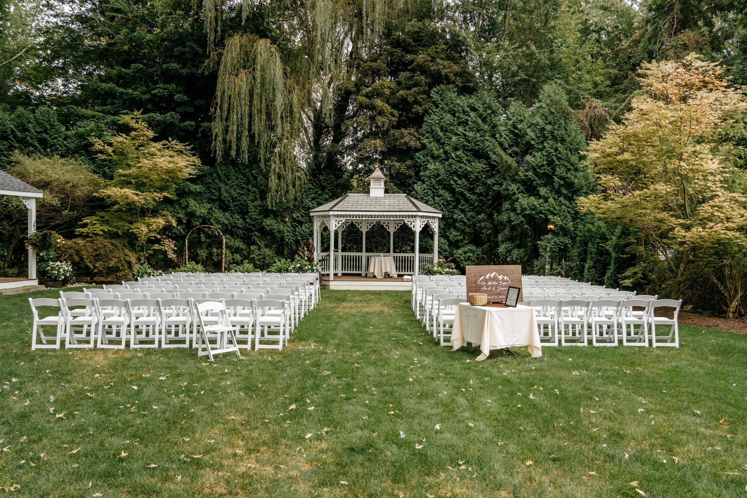 Elegant reception tent setup showcasing Boston wedding planning with decorated tables and lighting