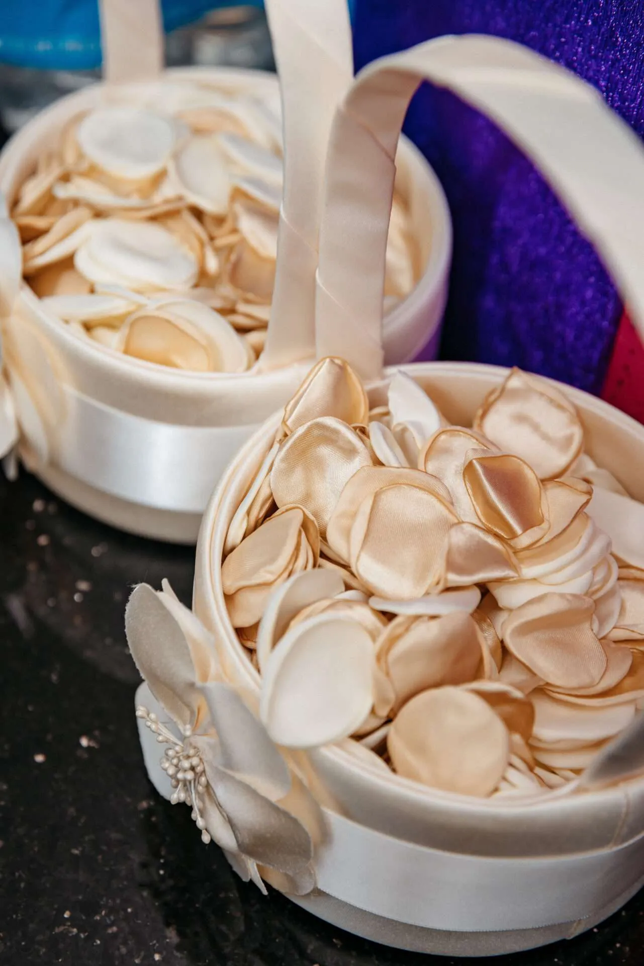 Flower petals in baskets for wedding at unique Burlington wedding locations