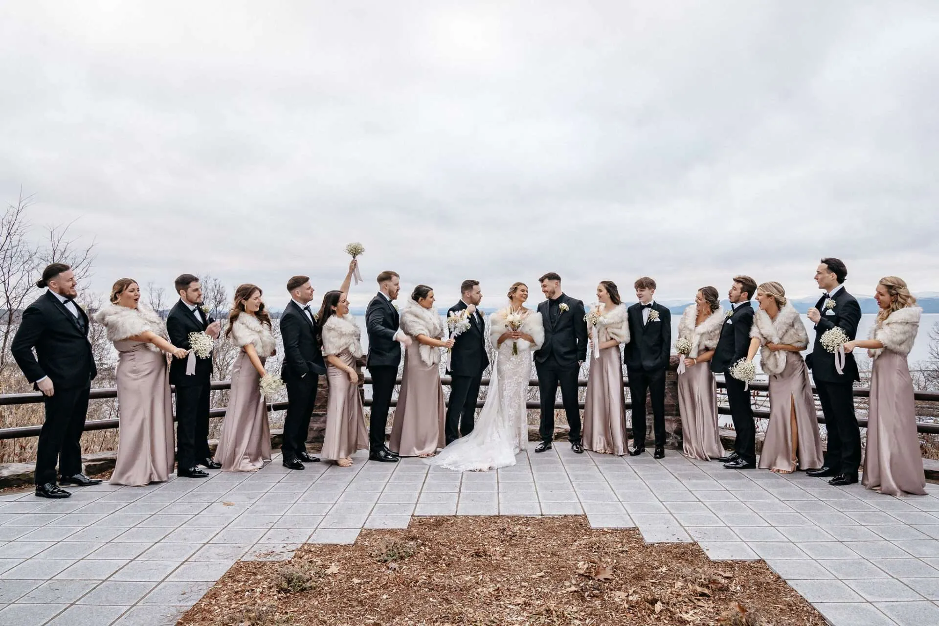 Bridal Party cheer in celebration after they learn the average wedding cost in Boston