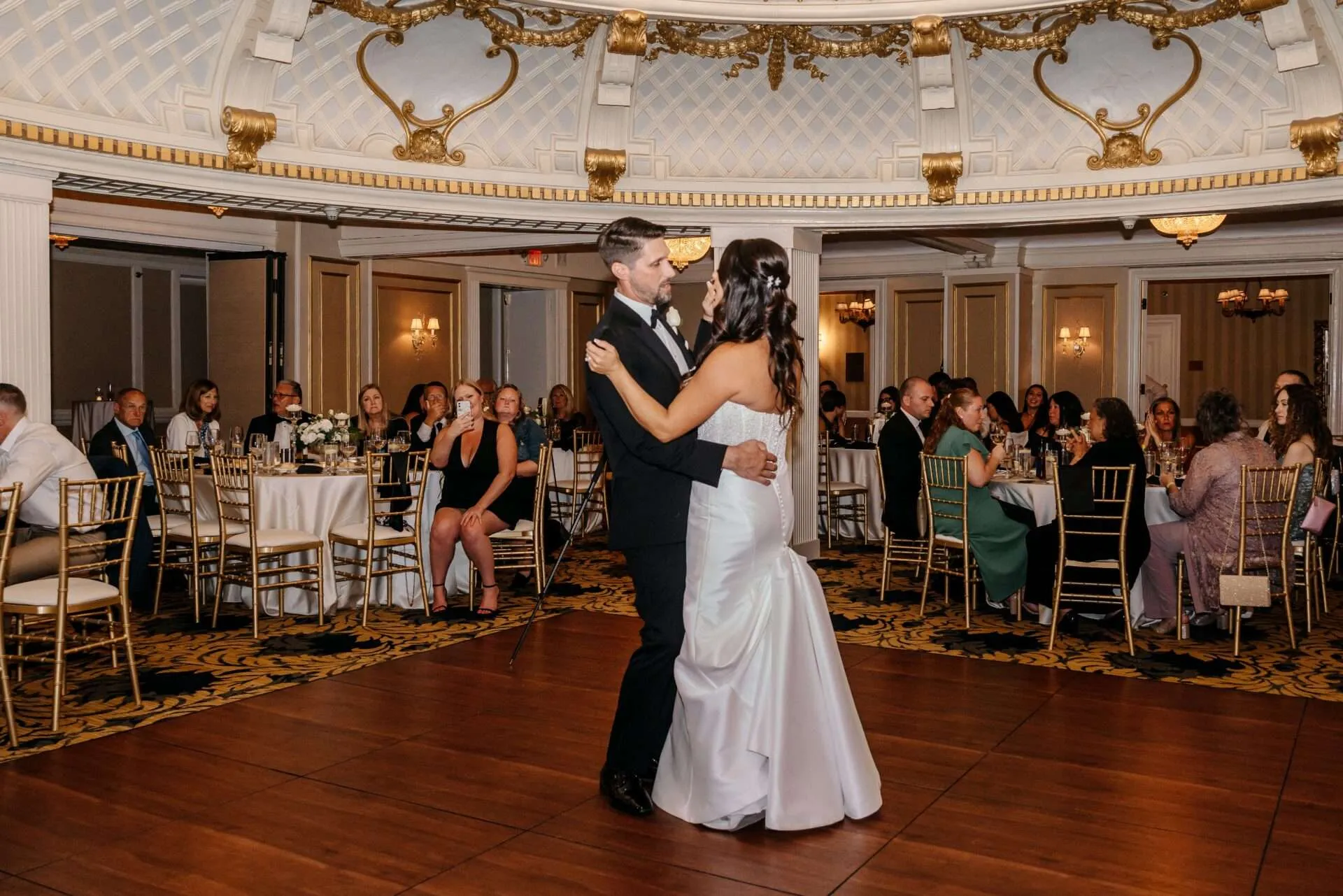 bride and groom having their first dance at the lenox hotel