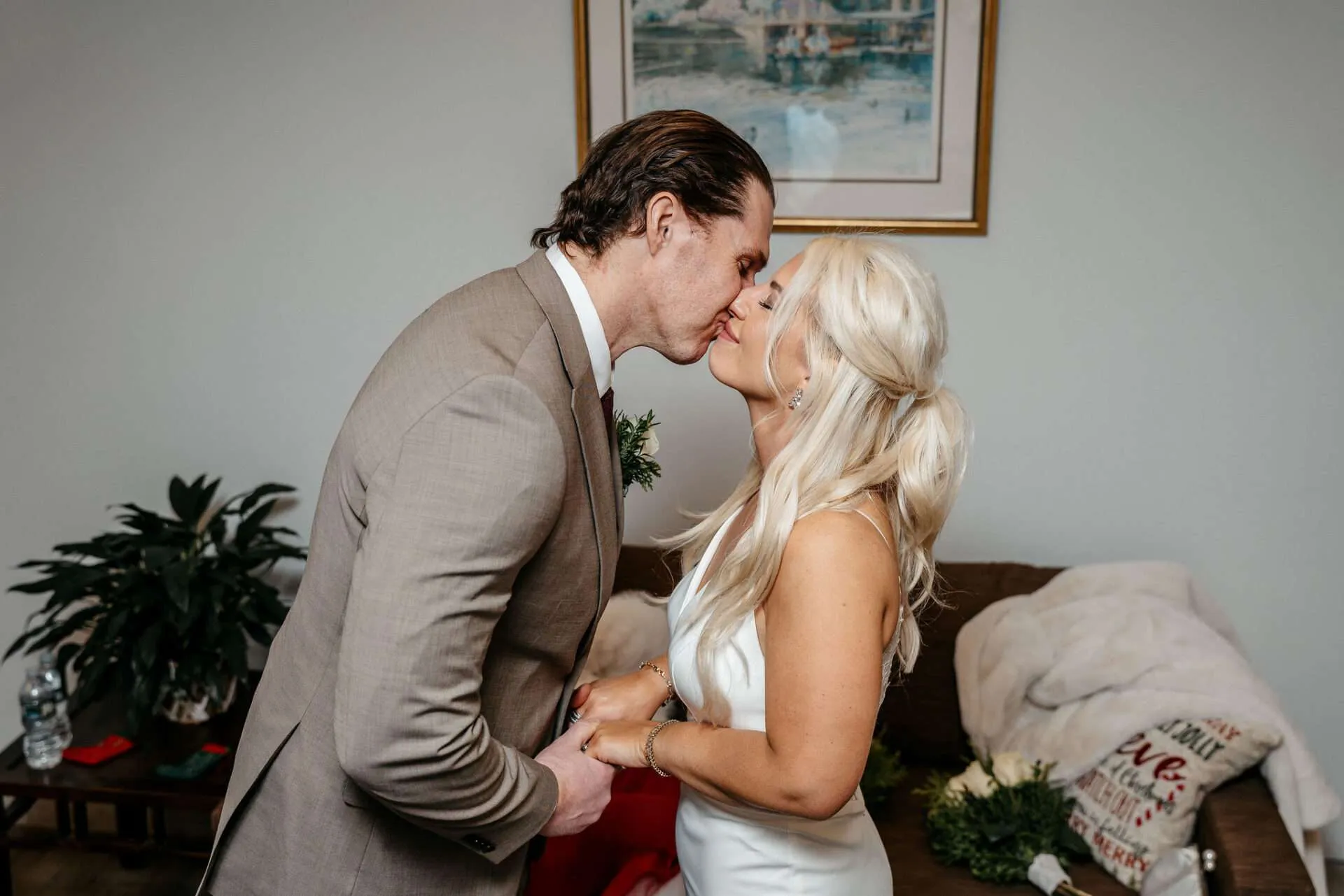 Bride and groom kiss after saying "I do" while getting married at city hall Boston