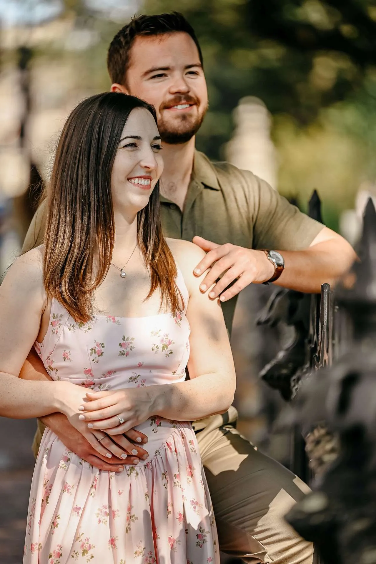 A couple smiles while looking for​restaurants for date night in boston.
