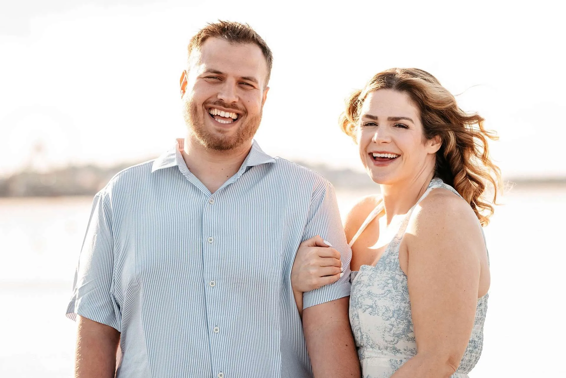 A couple laughs while talking about fun date ideas in boston ma.